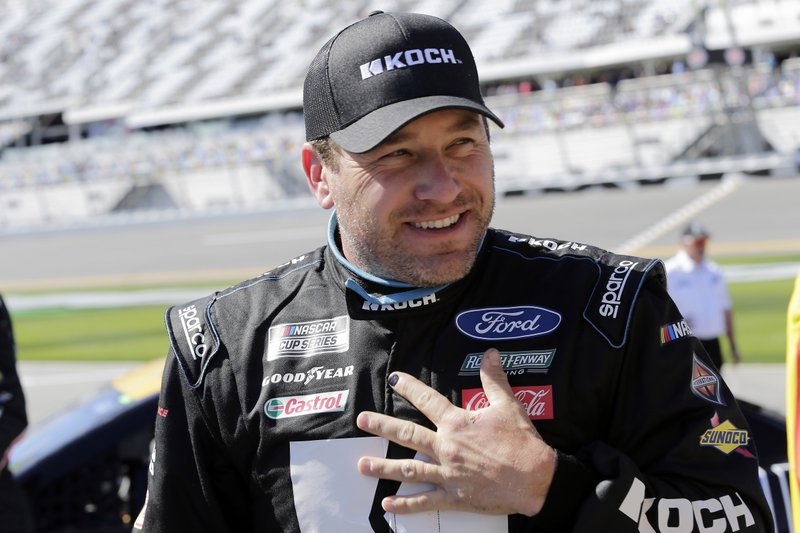 In this Feb. 9, 2020, file photo, Ryan Newman stands on pit road after his run during NASCAR auto racing qualifying at Daytona International Speedway in Daytona Beach, Fla.  (AP Photo/Terry Renna, File)