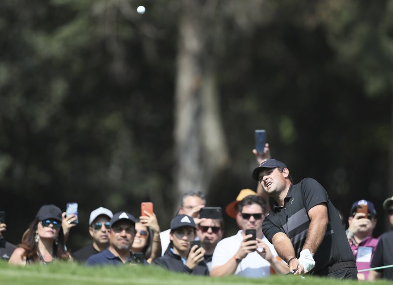 Patrick Reed of the United States approaches to the third green during the final round for the WGC-Mexico Championship golf tournament, at the Chapultepec Golf Club in Mexico City, Sunday, Feb. 23, 2020.(AP Photo/Fernando Llano)