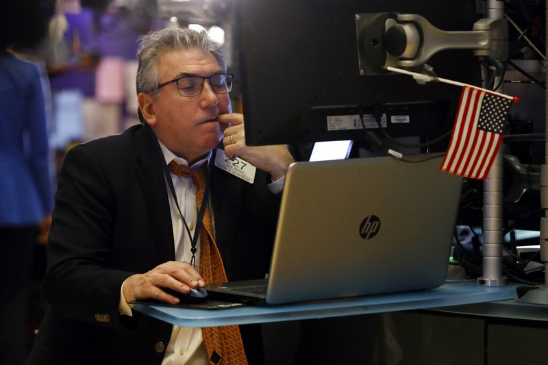 Trader John Bishop works on the floor of the New York Stock Exchange, Monday, Feb. 24, 2020.Markets are down across Europe and Asia, while futures for U.S. benchmarks have also dropped sharply.

