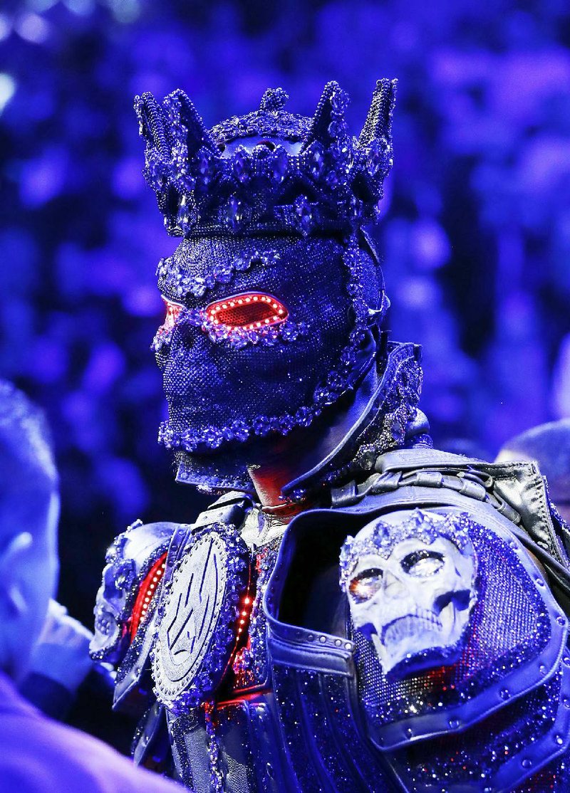 Deontay Wilder arrives in the ring for a WBC heavyweight championship boxing match against Tyson Fury, of England, Saturday, Feb. 22, 2020, in Las Vegas. (AP Photo/Isaac Brekken)