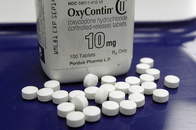 FILE - This Feb. 19, 2013, file photo shows OxyContin pills arranged for a photo at a pharmacy in Montpelier, Vt. story.lead_photo.caption