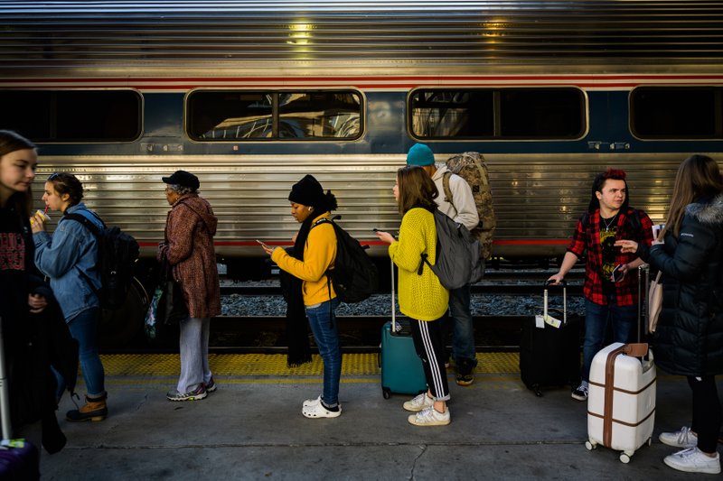 Passengers wait to board an Amtrak train at Washington's Union Station in November. MUST CREDIT: Washington Post photo by Salwan Georges.