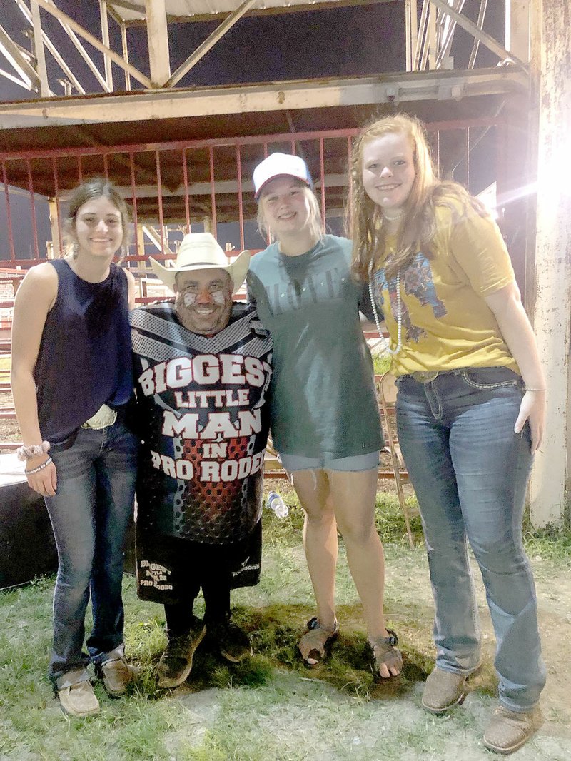 SUBMITTED PHOTO Members of Prairie Grove FFA Chapter participated in the Winter Leadership Conference at Camp Couchdale. SUBMITTED PHOTO These members of Prairie Grove FFA Chapter worked at the Professional Bull Riders event at the Rodeo of the Ozarks in Springdale: Addie Nall (left), Porkchop, Gracie Foster, Brie Rochier.