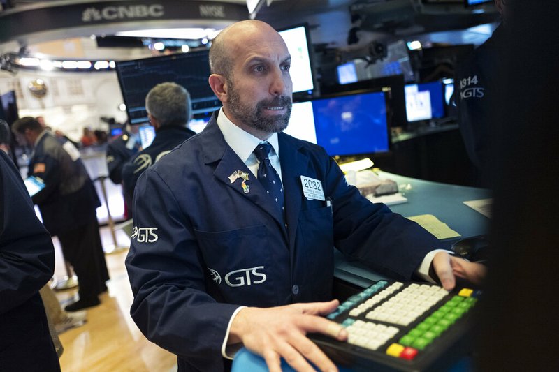 James Denaro monitors stock prices at the New York Stock Exchange, Wednesday, Feb. 26, 2020.

