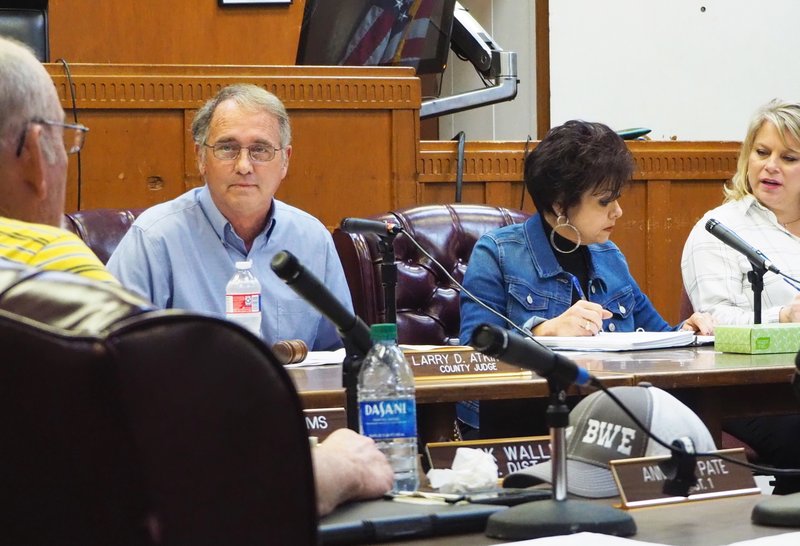 A Jan. 6, 2020, Banner-News file photo shows Columbia County Judge Larry Atkinson (left) during a regular Quorum Court gathering. 