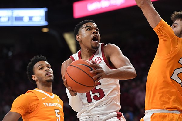 Arkansas' Mason Jones goes up for a shot during a game against Tennessee on Wednesday, Feb. 26, 2020, in Fayetteville. 