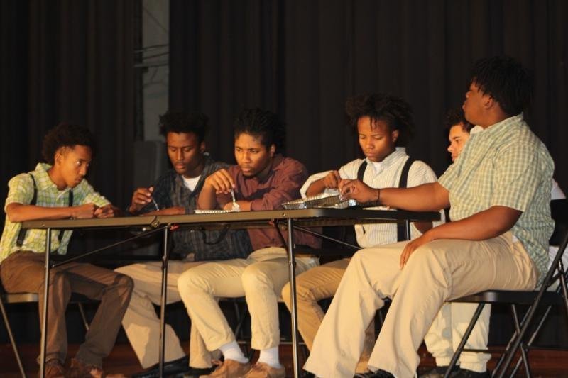 Students from Meridian High School in Mississippi -- Xzavier Henderson (from left), Isaiah Matthew, Josh Davis, Ka'Lerion Alford, Gregory Melton and Ja'Braun Smith -- in a scene from the play Death by Design (The Secret Holocaust of Wrightsville, Arkansas)

(Special to the Democrat-Gazette)