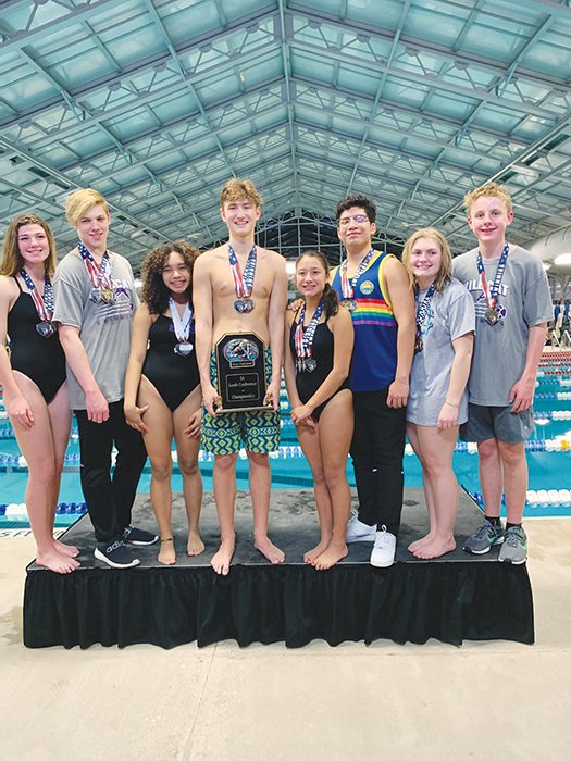 Contributed Photo El Dorado swimmers Abigail Thompson, Payton Allman, Adrianna Arnold, Everett Gati, Jana Powell, Aleck Ramirez, Rachel Murphree and Luke Utsch pose with their medals after the 5A-South Conference Meet earlier this month, which saw the Wildcats win the conference title. El Dorado's swim teams will compete at the state meet this weekend.