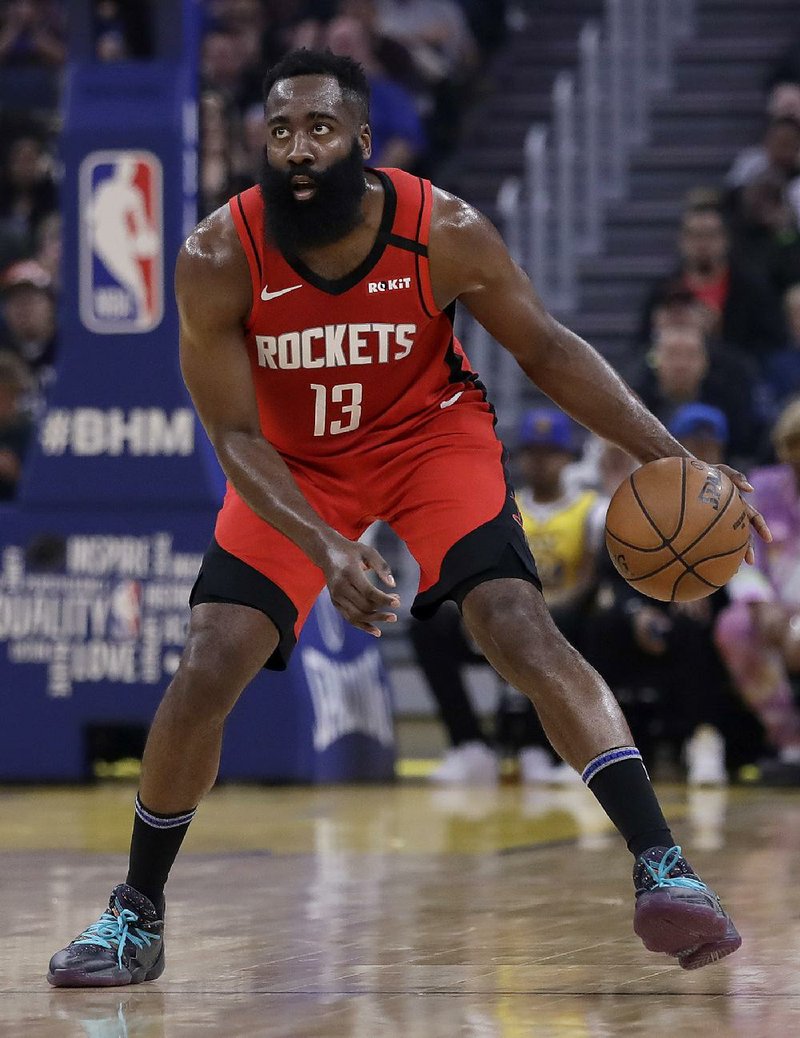 Houston Rockets' James Harden drives the ball against the Golden State Warriors in the first half of an NBA basketball game Thursday, Feb. 20, 2020, in San Francisco. (AP Photo/Ben Margot)