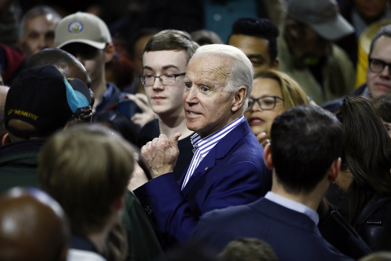 Democratic presidential candidate former Vice President Joe Biden meets with attendees during a campaign event, Friday, Feb. 28, 2020, in Spartanburg, S.C. (AP Photo/Matt Rourke)

