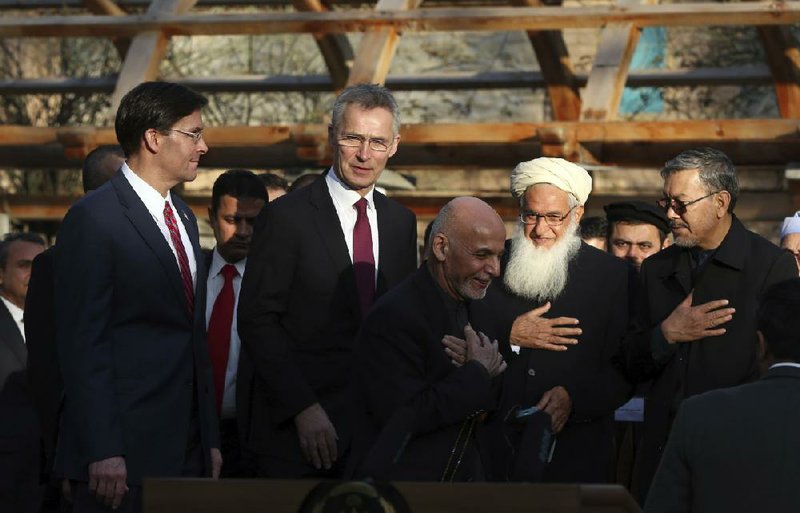 Defense Secretary Mark Esper (from left) joins NATO Secretary-General Jens Stoltenberg and Afghan President Ashraf Ghani for a news conference Saturday at the presidential palace in Kabul.
(AP/Rahmat Gul)