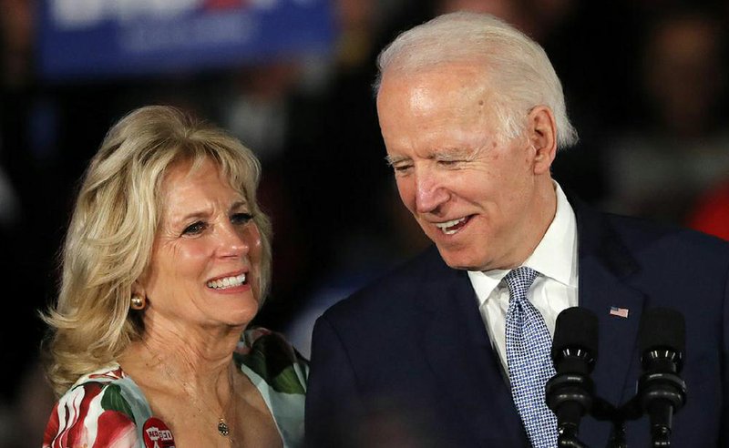Former Vice President Joe Biden and his wife, Jill, attend a rally Saturday night in Columbia, S.C., after his victory in the state’s Democratic presidential primary “We are very much alive,” Biden declared. More photos at arkansasonline.com/31primary/.
(AP/Gerald Herbert)