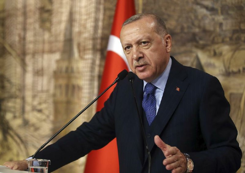 “We will not close the gates to refugees,” Turkish President Recep Tayyip Erdogan said Saturday during a speech in Istanbul. “The European Union has to keep its promises. We are not obliged to look after and feed so many refugees.” More photos at arkansasonline.com/31turkey/.
(AP)