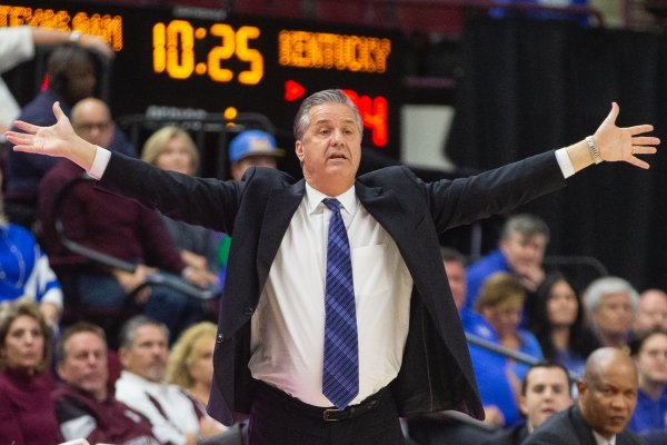 Kentucky head coach John Calipari gestures during a game against Texas A&M during the first half of an NCAA college basketball game Tuesday, Feb. 25, 2020, in College Station, Texas. (AP Photo/Sam Craft)