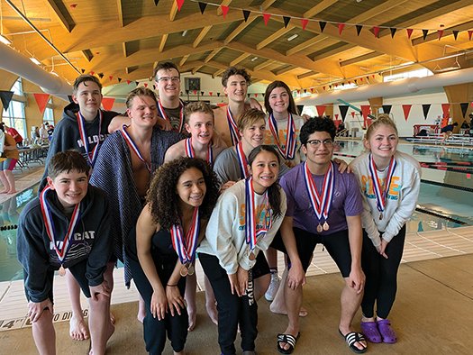 Contributed Photo Members of El Dorado's swim teams pose with the medals they won at the 5A State Swimming & Diving Championships, which were held in Russellville over the weekend.