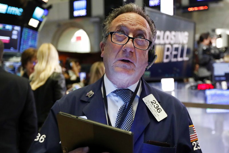 Trader Steven Kaplan watches the numbers at the closing bell on the floor of the New York Stock Exchange, Monday, March 2, 2020. The Dow Jones Industrial Average surged more than 1,200 points, or 5%, on hopes that central banks will take action to shelter the global economy from the effects of the coronavirus outbreak.

