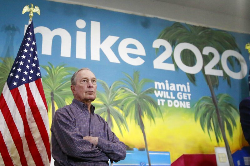 In this March 3, 2020 photo, Democratic presidential candidate former New York City Mayor Mike Bloomberg waits to speak at a news conference, in the Little Havana neighborhood, in Miami. (AP Photo/Brynn Anderson)