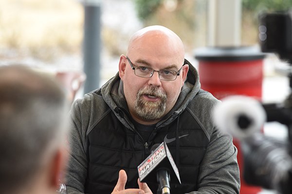 Arkansas linebackers coach Rion Rhoades speaks to reporters on Thursday, Feb. 6, 2020, in Fayetteville.