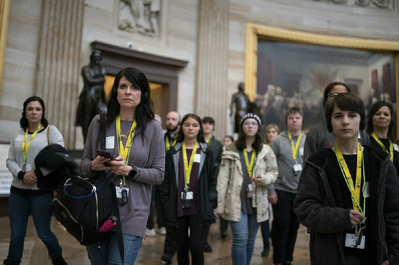 Visitors tour the Capitol Rotunda on Tuesday in Washington.
(AP/J. Scott Applewhite)