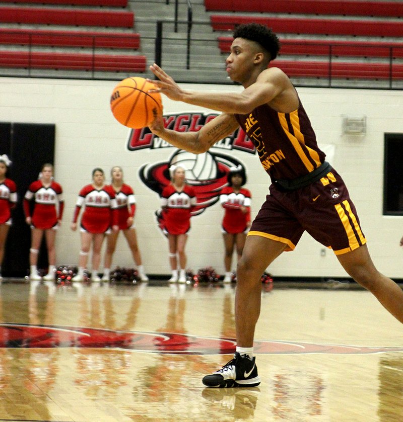 Lake Hamilton senior Adjani Winston (23) passes to a teammate in Wednesday's first-round game against Maumelle in the Class 5A state tournament at Russellville. - Photo by James Leigh of The Sentinel-Record