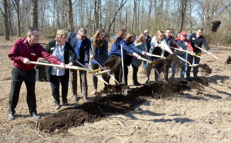 Janelle Jessen/Siloam Sunday Local officials take part in a groundbreaking ceremony for a new Children's Advocacy Center in Gentry on Thursday.