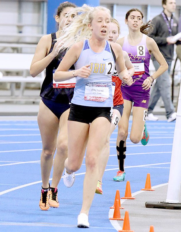 Photo courtesy of JBU Sports Information John Brown sophomore Allika Pearson competes in the 5,000-meter run at the NAIA Indoor National Championships on Thursday in Brookings, S.D.