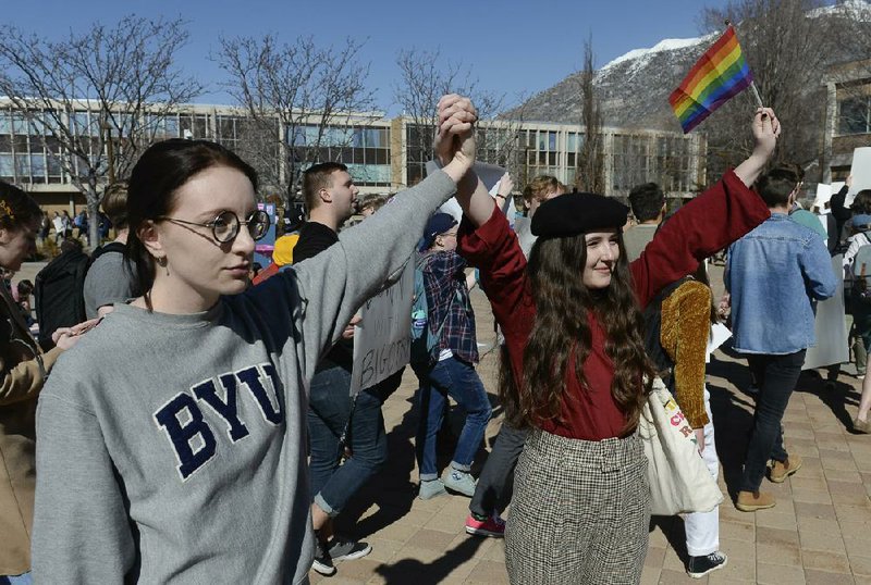 Students protest last week outside the student center at Brigham Young University in Provo, Utah, after an official issued a clarification on the school’s honor code, which said same-sex romantic behavior is still “not compatible” with the university’s rules. More photos at arkansasonline.com/38byu/.
(AP/The Salt Lake Tribune/Francisco Kjolseth)
