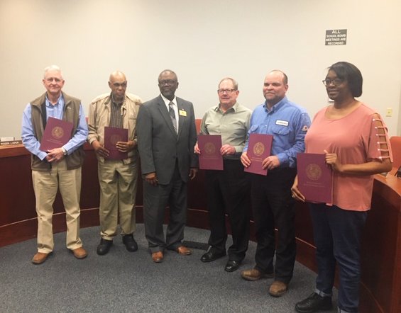 Magnolia School District Board of Education members are recognized for their volunteerism by State Rep. David Fielding (middle left) of Magnolia. Pictured (L-R) are board members Roger Loper, William Watson, Mike Waters, Steven Souter, and Lynsandra Curry. 