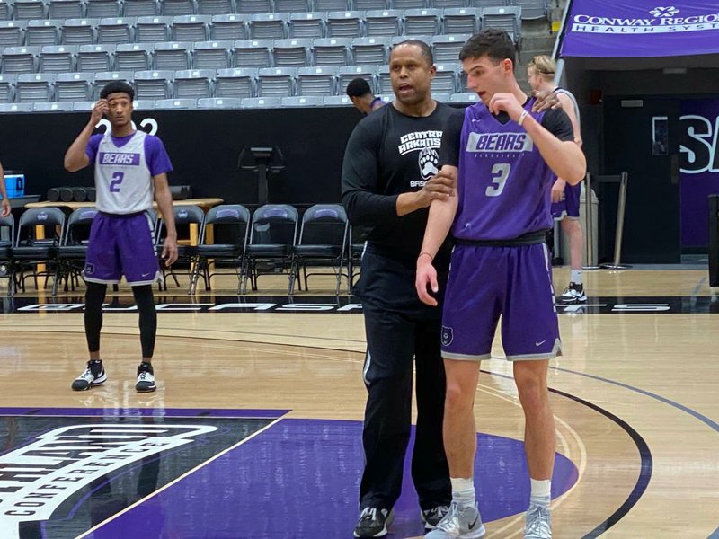 Anthony Boone (left) was named the new men’s basketball coach at Central Arkansas on Monday. Boone went 9-13 in the nal 22 games on an interim basis after replacing Russ Pennell in January. (Arkansas Democrat-Gazette/Trenton Daeschner) 
