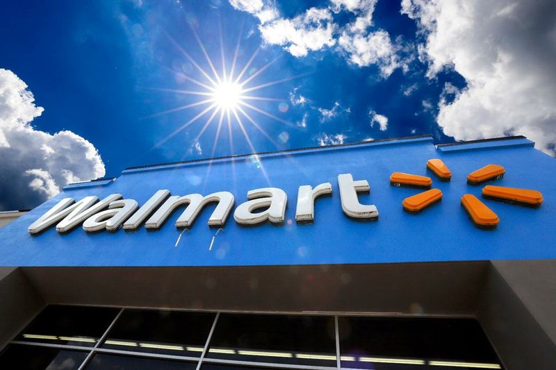 This June 25, 2019, file photo shows the entrance to a Walmart location. (AP Photo/Gene J. Puskar, File)