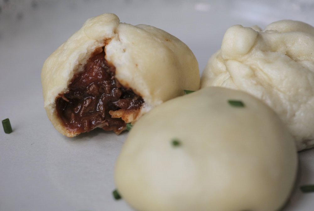 These Steamed Buns were filled with sauced beef barbecue. (Arkansas Democrat-Gazette/John Sykes Jr.)