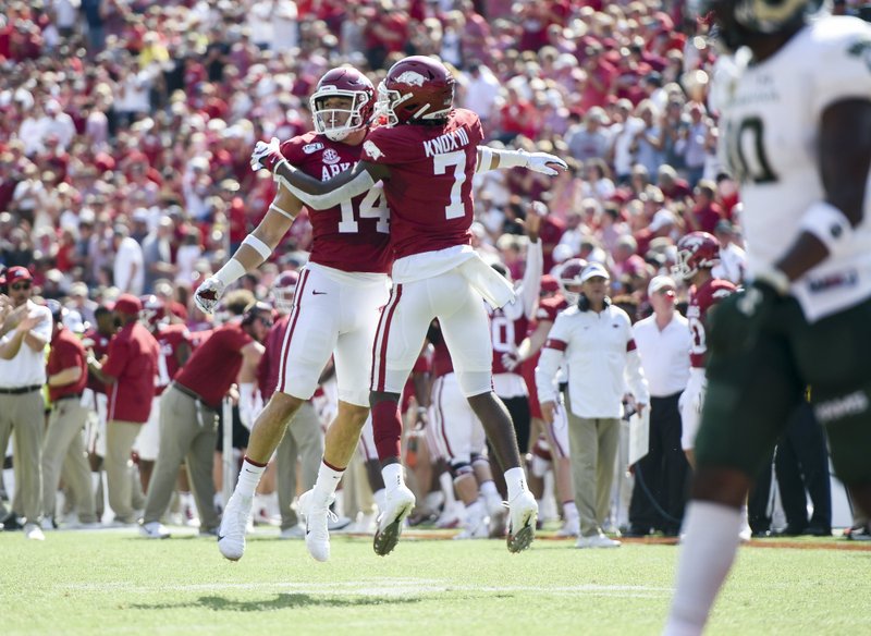 Arkansas Razorbacks tight end Chase Harrell (14) reacts after scoring a touchdown during the first quarter of a Sept. 14, 2019, game at Donald W. Reynolds Razorback Stadium in Fayetteville. - Photo by Charlie Kaijo of NWA Democrat-Gazette