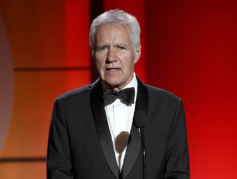 FILE - In this April 30, 2017, file photo, Alex Trebek speaks at the 44th annual Daytime Emmy Awards at the Pasadena Civic Center in Pasadena, Calif. The "Jeopardy!" host says his response to advanced pancreatic cancer treatment is "kind of mind-boggling" and his doctors say the 78-year-old is in "near remission." Trebek tells People magazine he's responding very well to chemotherapy and the doctors have told him "they hadn't seen this kind of positive results in their memory." Trebek says some of the tumors have shrunk by more than 50%. (Photo by Chris Pizzello/Invision/AP, File)