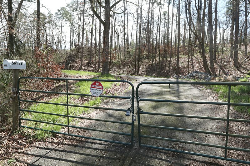 A developer envisions building a complex of vacation rental properties off Buena Vista Road, across a cove from a property owner's association that objects to the plan. - Photo by Richard Rasmussen of The Sentinel-Record