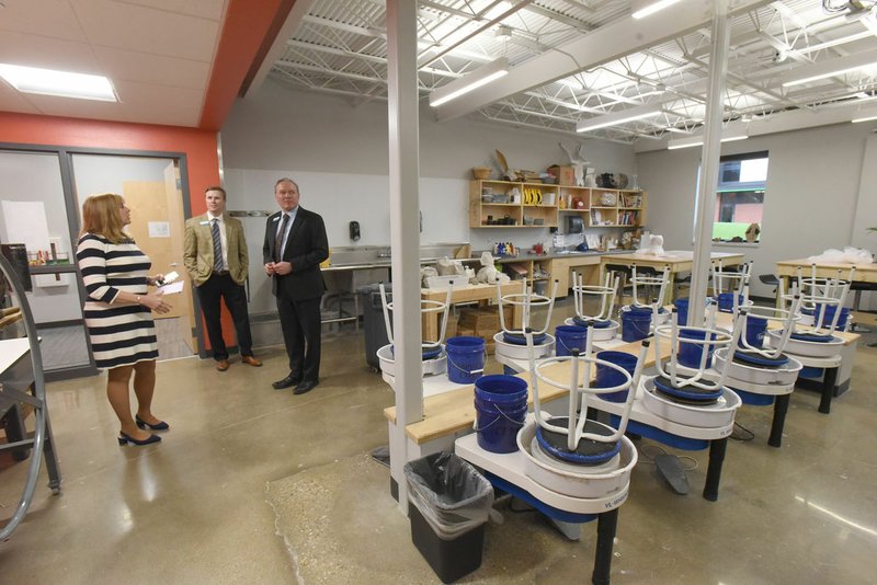 Arkansas Arts Academy CEO Mary Ley gives a tour of the school's pottery lab March 14 2019, during a dedication marking completion of the Arkansas Arts Academy high school campus. (File Photo/NWA Democrat-Gazette/Flip Putthoff)