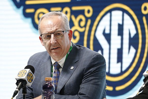SEC Commissioner Greg Sankey announces Wednesday, March 11, 2020, that fans will not be allowed in the arena to watch NCAA college basketball games in the SEC tournament in Nashville, Tenn., starting Thursday. The Southeastern Conference joined the rest of the Power Five leagues and announced that only family and essential personnel would attend its men's and women's tournament basketball games. 
(AP Photo/Mark Humphrey)


