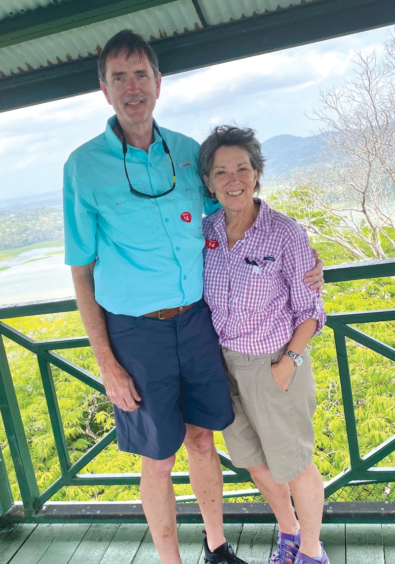 Charlotte and Mark Strickland of Conway pose in the forest in Panama. The couple, whose anniversary is in July, took a celebratory cruise March 1 through Wednesday. Two crew members on their ship had transferred from a ship that later had a case of the coronavirus. The 3,000 passengers, including the Stricklands, were detained at sea before their last stop and unable to disembark until the crew members tested negatively for the virus. Charlotte said “my heart goes out” to the cruise lines and its employees, who are trying to make a living, as well as take care of passengers.