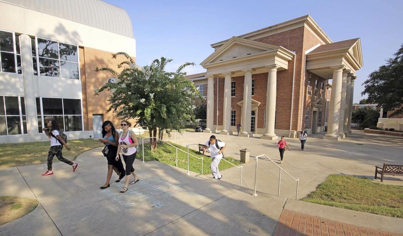 Students walk the Southern Arkansas University campus in Magnolia. 