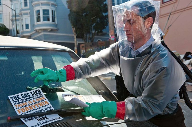 Jude Law deals with misinformation in a scene from the 2011 movie Contagion, which has surged in popularity in recent weeks.