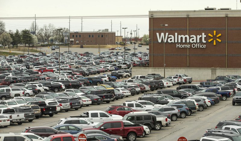 Cars fill the parking lot Friday at Walmart’s home office in Bentonville. Go to nwaonline.com/200314Daily/ for today’s photo gallery.
(NWA Democrat-Gazette/Ben Goff)