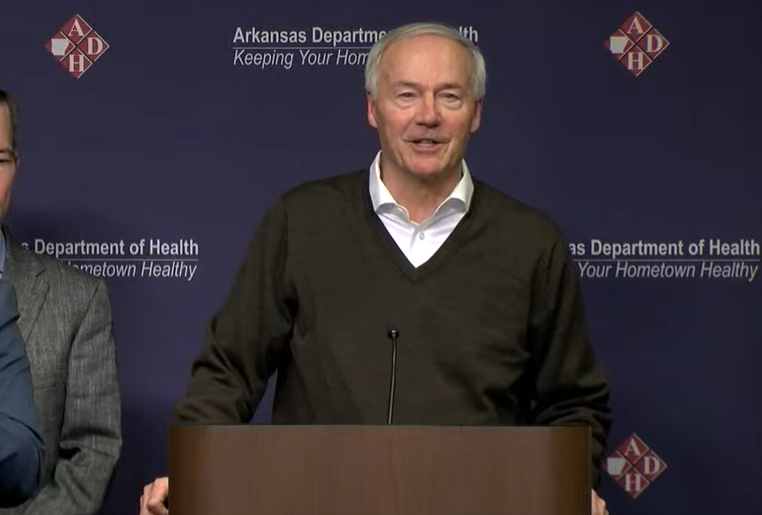 Gov. Asa Hutchinson provides an update on coronavirus in the state on Sunday afternoon in this screenshot from a live feed.