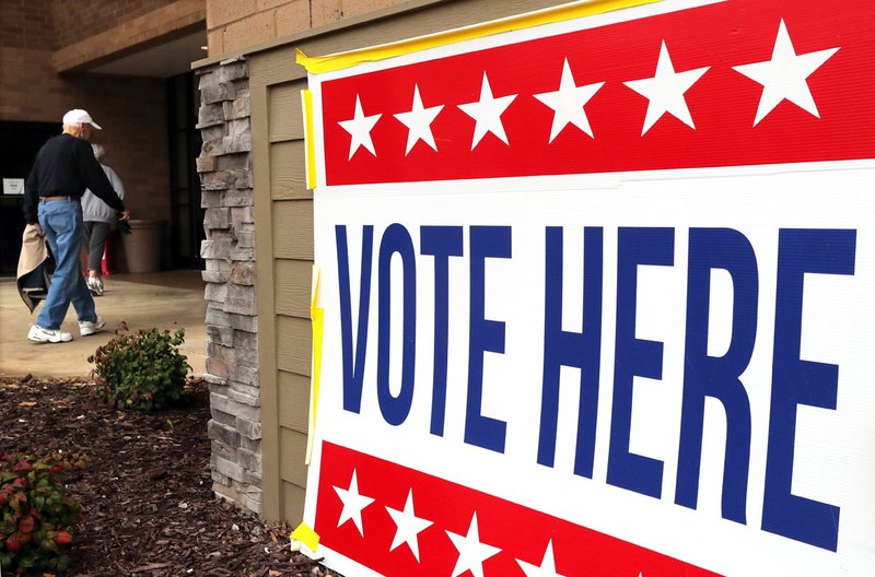 A sign outside an early voting location that was opened earlier this month at the Hot Springs Mall for the preferential primaries, nonpartisan general election, District 22 special election, and annual school elections. - Photo by Richard Rasmussen of The Sentinel-Record