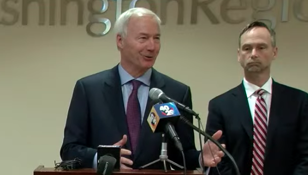 Arkansas Gov. Asa Hutchinson speaks at a news conference in Fayetteville on Monday in this screenshot from a live feed.