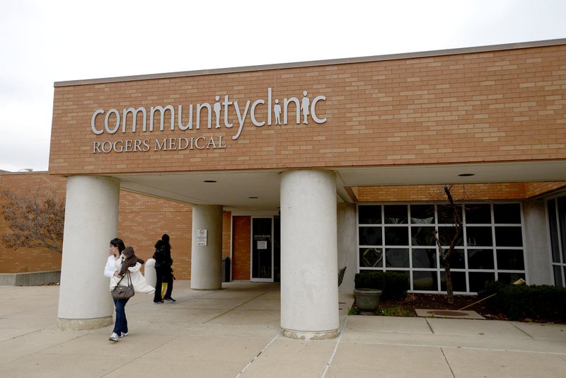 Patients pass through the entrance Thursday, Dec. 20, 2012, at Community Clinic in Rogers. (NWA Democrat-Gazette/FILE PHOTO)