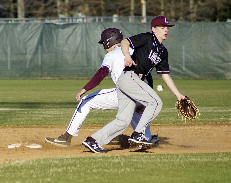 Westside Eagle Observer/RANDY MOLL Gentry's Azariah Wood slides into second ahead of the throw during play against Lincoln in Gentry on March 10.