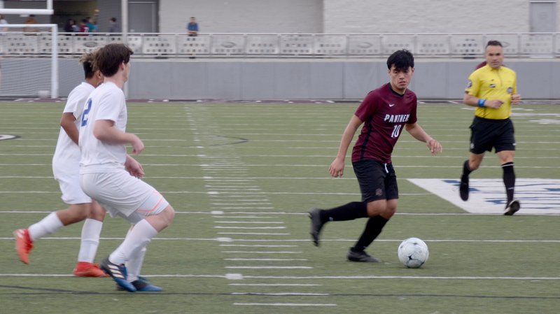 Graham Thomas/Herald-Leader Siloam Springs senior Franklin Cortez looks to make a play last Thursday against Decatur at Panther Stadium. Due to the coronavirus, the Arkansas Activities Association canceled all games from March 15-30 and have implemented a dead period, which began on Tuesday, March 17. The AAA will re-evaluate the situation on March 30.