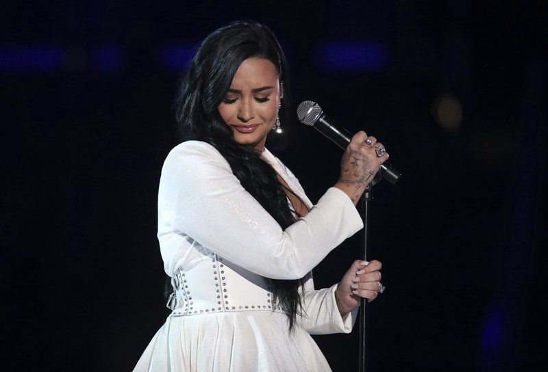 Demi Lovato, seen here performing at the 62nd annual Grammy Awards in January, has struggled for years with an eating disorder and eventually ended up in the hospital after a drug overdose. After rehab and hiring a new management team, Lovato is on the road to a healthy recovery.

(Invision/AP/Matt Sayles)