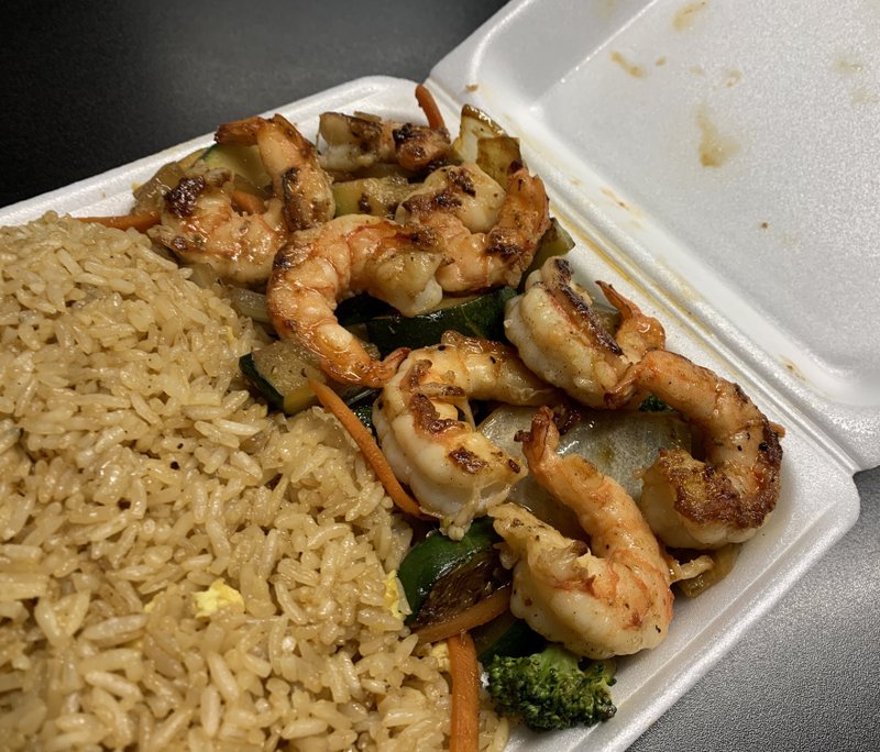 Hibachi meals, including the Hibachi Shrimp, come atop a base of mixed vegetables (zucchini, broccoli, carrot and onion) with a copious portion of “eggs fried rice” at Bamboo Hibachi on North Little Rock’s Camp Robinson Road.
(Arkansas Democrat-Gazette/Eric E. Harrison)