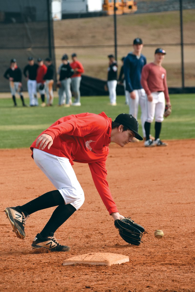 Searcy freshman Kade Ivy fields a ground ball at a practice. The Lions finished 7-19 a year ago, missing the playoffs for the first time in seven years. 