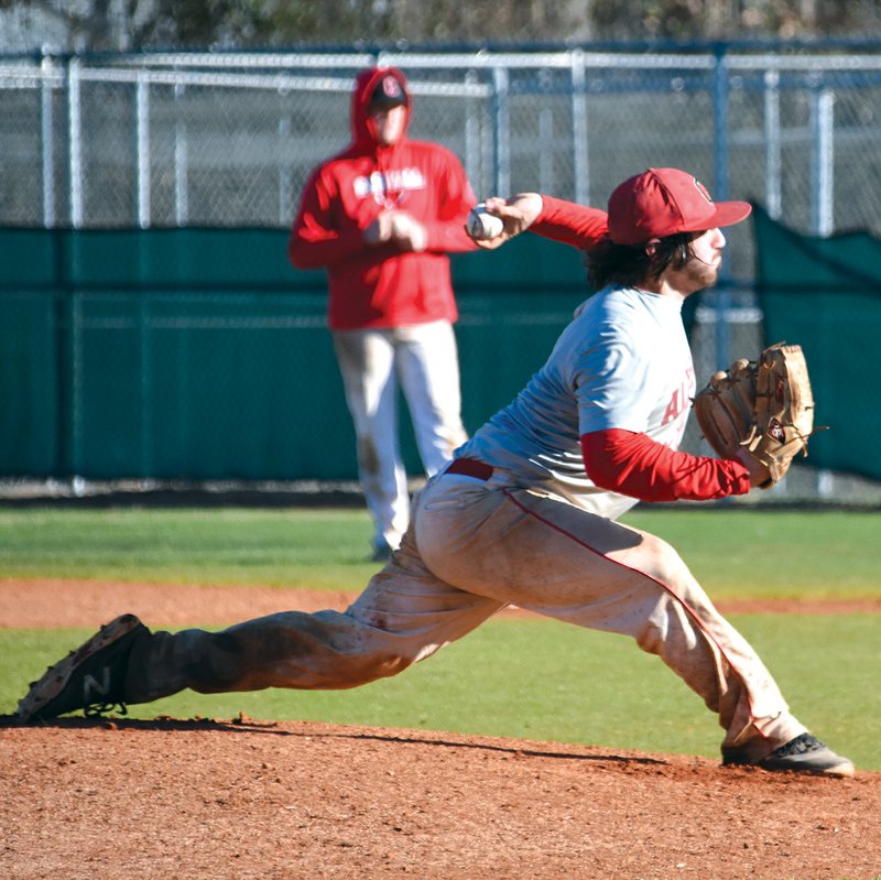 Cabot senior Patrick Babcock delivers a pitch during a practice. Babcock is committed to Allen County Junior College in Kansas.